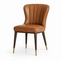 Sedia da pranzo imbottita in similpelle cognac con schienale avvolgente, 58 x 61 x 86 cm